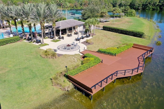 birds eye view of property with a water view