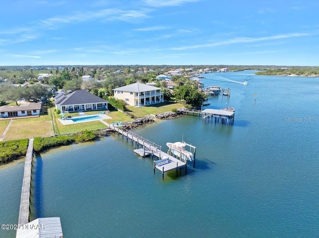 drone / aerial view with a water view