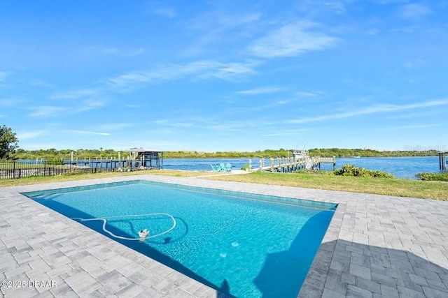 view of pool with a water view