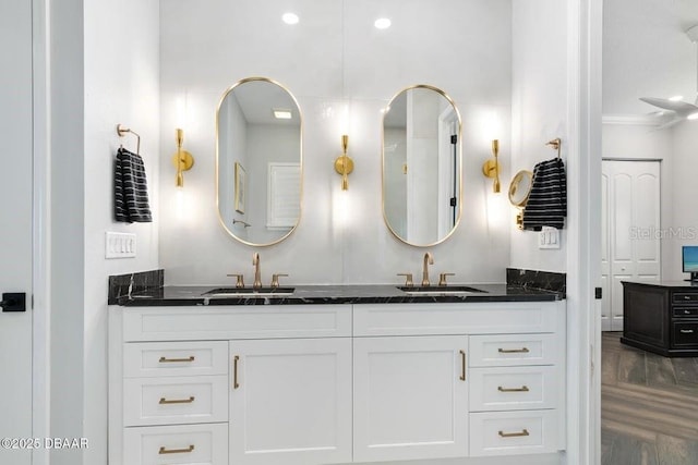 bathroom featuring vanity and parquet floors