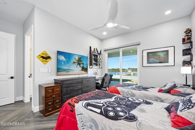 bedroom with access to outside, ceiling fan, and parquet flooring