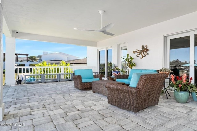 view of patio / terrace featuring outdoor lounge area and ceiling fan