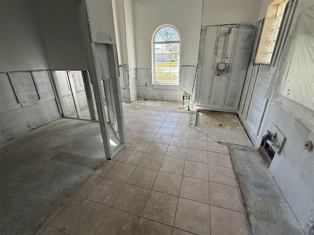 bathroom with tile patterned floors