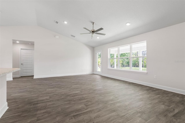 13 Primrose Ln, Palm Coast, FL 32164 - spare room featuring lofted ceiling, a ceiling fan, baseboards, dark wood-style flooring, and recessed lighting