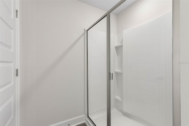 13 Primrose Ln, Palm Coast, FL 32164 - bathroom with a stall shower