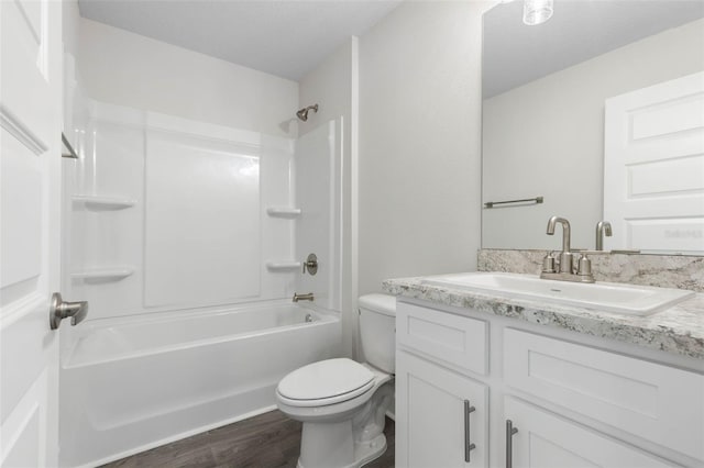 13 Primrose Ln, Palm Coast, FL 32164 - full bath featuring vanity, toilet,  shower combination, and wood finished floors