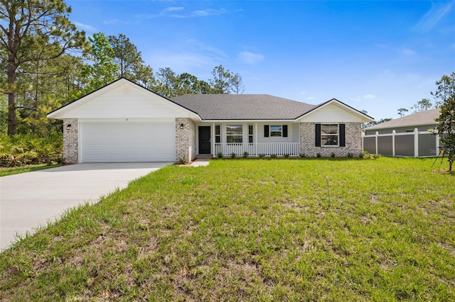 13 Primrose Ln, Palm Coast, FL 32164 - single story home with covered porch, brick siding, and an attached garage