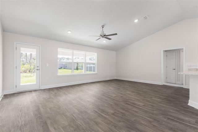 13 Primrose Ln, Palm Coast, FL 32164 - unfurnished living room with lofted ceiling, a ceiling fan, dark wood-style floors, baseboards, and recessed lighting