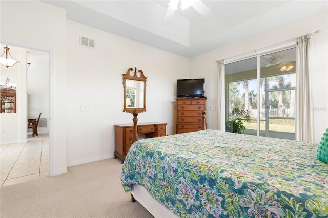 carpeted bedroom featuring access to exterior and ceiling fan