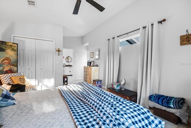 bedroom featuring ceiling fan and a closet