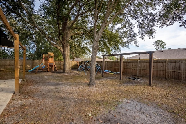 view of yard with a playground