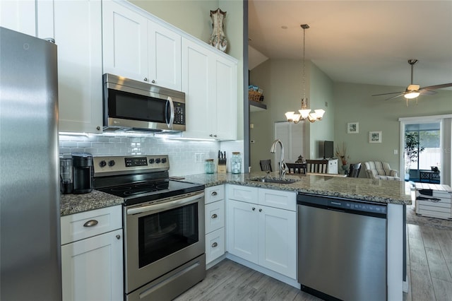 kitchen featuring white cabinetry, stainless steel appliances, and sink