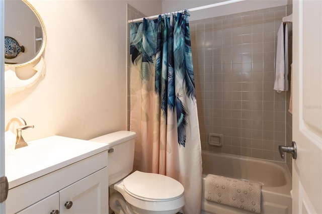 full bathroom featuring vanity, shower / bathtub combination with curtain, and toilet