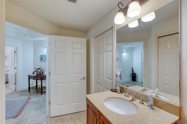 bathroom featuring vanity and ornamental molding