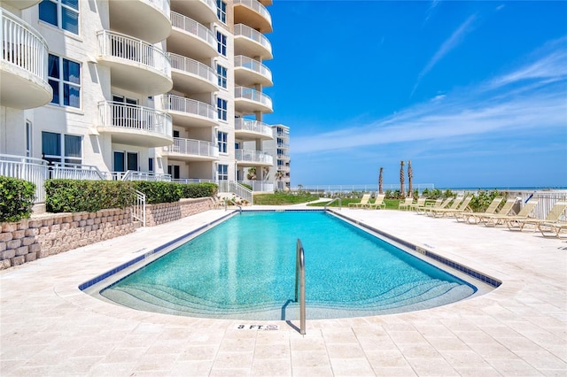 view of pool with a patio