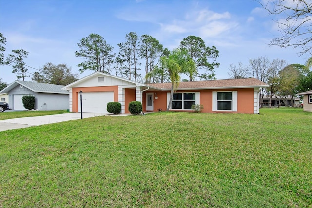 single story home with a garage, concrete driveway, and a front lawn