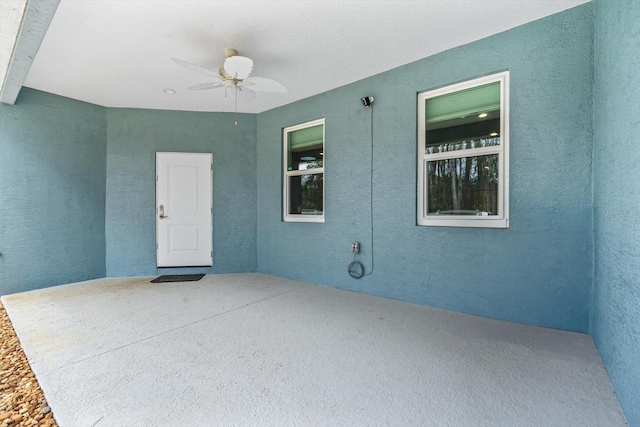 view of patio / terrace with ceiling fan