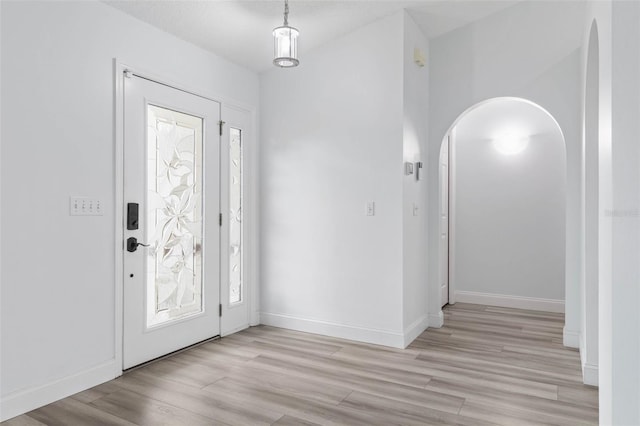 entrance foyer with light hardwood / wood-style floors