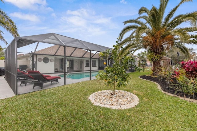 view of yard with a patio and a lanai