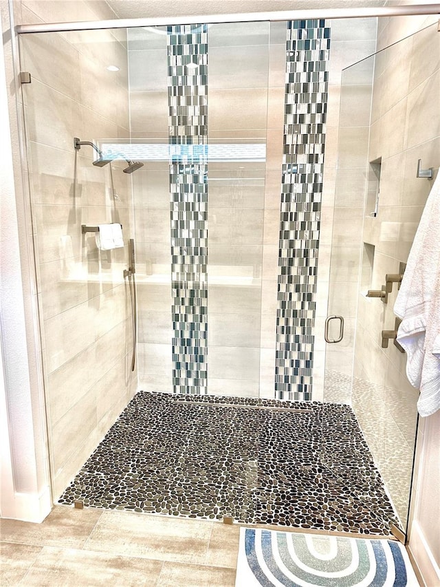 bathroom with an enclosed shower