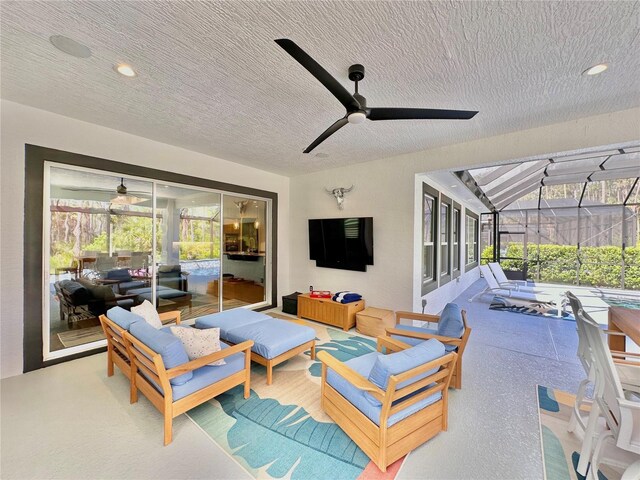 view of patio / terrace with outdoor lounge area and glass enclosure