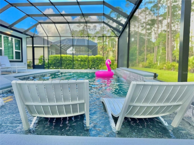 view of patio featuring a lanai