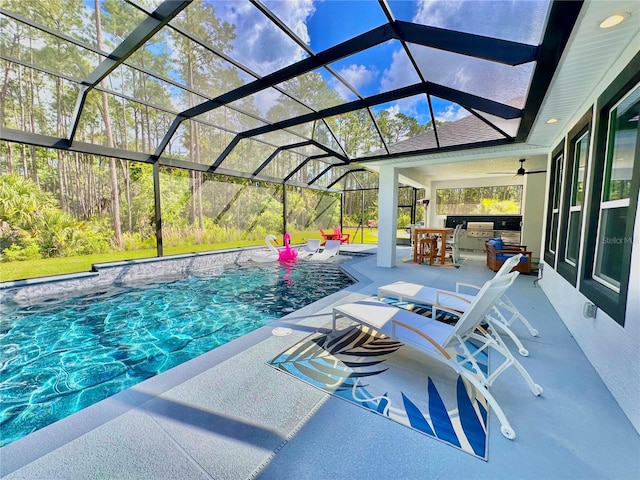 view of pool with a patio, a lanai, and a bar