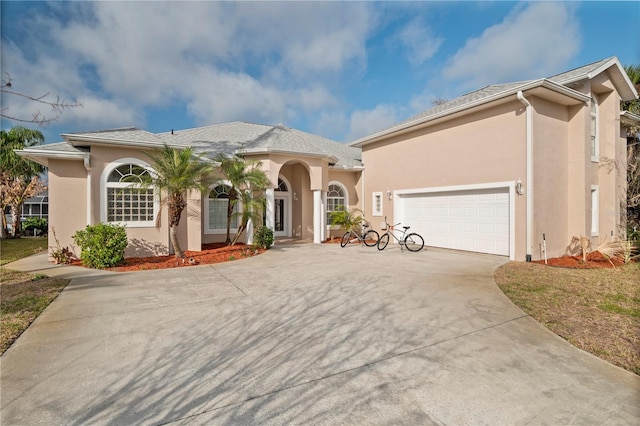 view of front of home with a garage