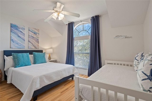 bedroom featuring wood-type flooring and ceiling fan