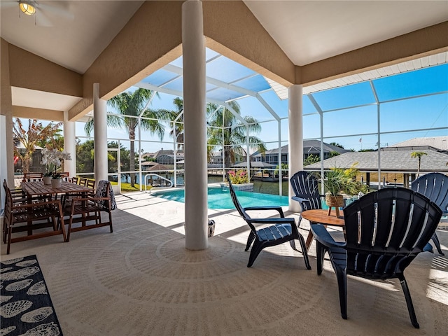 view of patio / terrace with a lanai