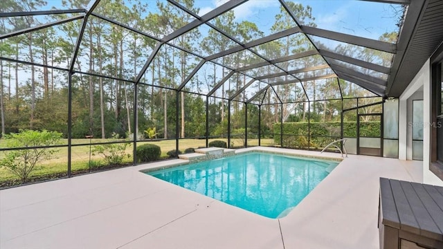 view of swimming pool with a lanai and a patio area