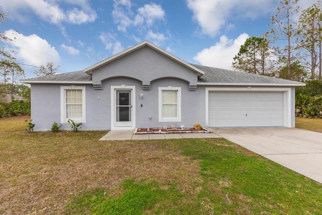 single story home featuring a garage and a front lawn