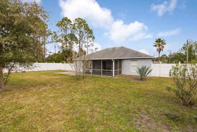 view of yard with a sunroom