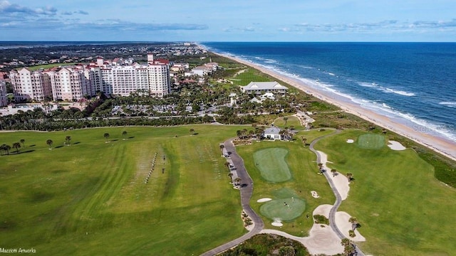 aerial view featuring a water view and a beach view