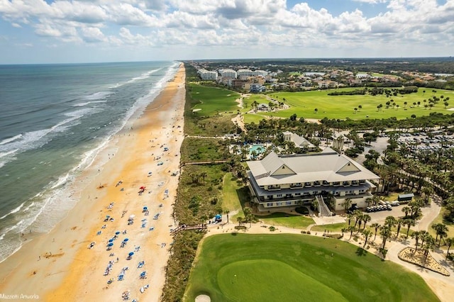 aerial view featuring a water view and a beach view