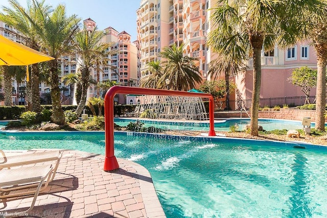 view of pool featuring pool water feature