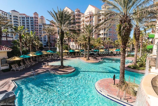 view of swimming pool featuring a patio