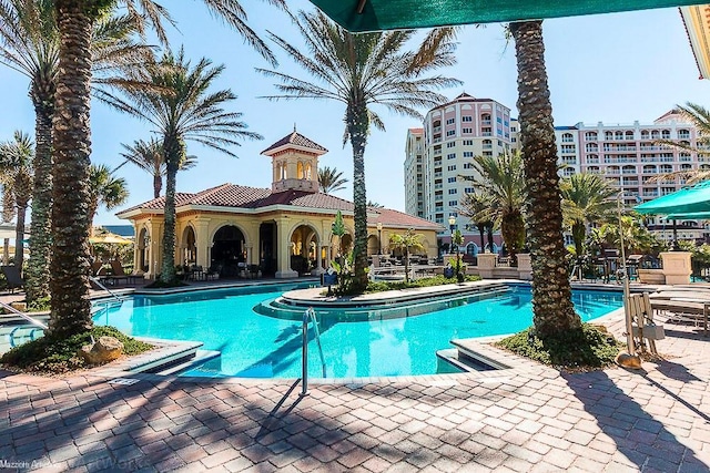 view of swimming pool featuring a patio