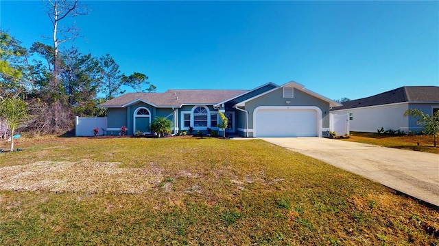 ranch-style home featuring a garage and a front lawn