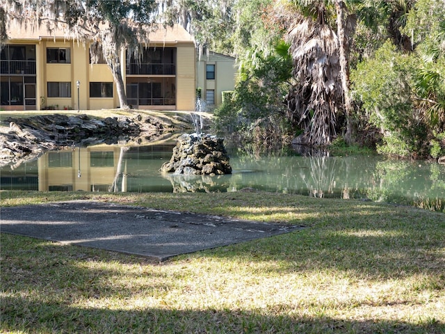 view of community featuring a lawn