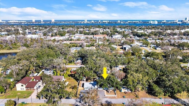 drone / aerial view with a water view