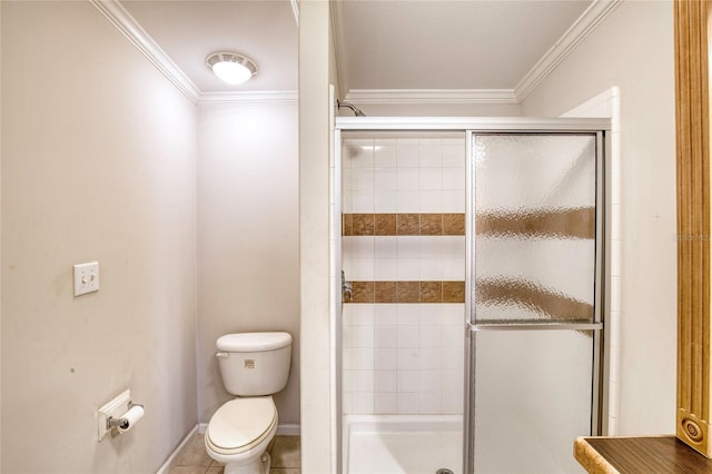 bathroom with a shower with door, ornamental molding, toilet, and tile patterned floors