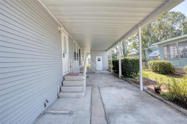 view of patio / terrace with a carport