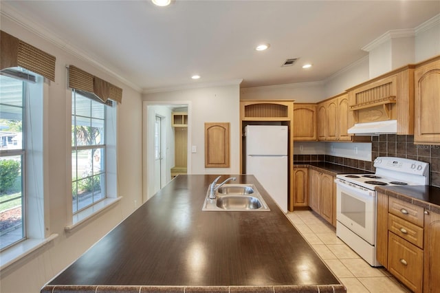 kitchen featuring white appliances, ornamental molding, sink, and light tile patterned floors