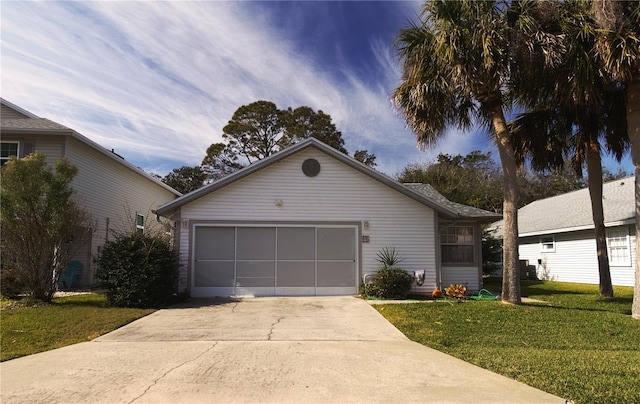 ranch-style house with a garage and a front yard