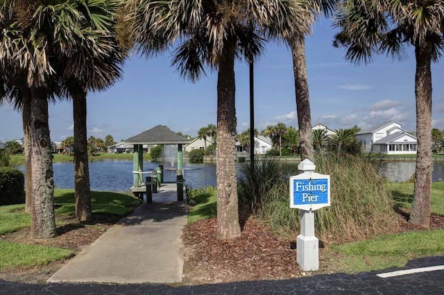 exterior space featuring a water view and a gazebo