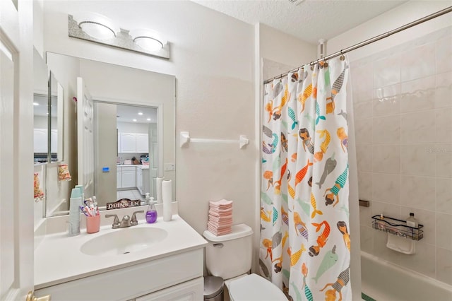 full bathroom featuring vanity, shower / tub combo, a textured ceiling, and toilet