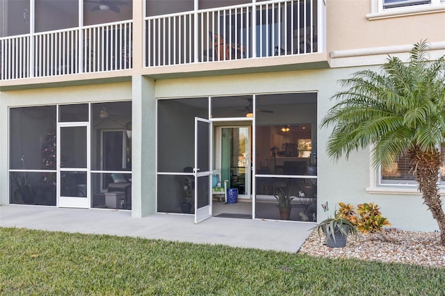 exterior space featuring a patio and a balcony