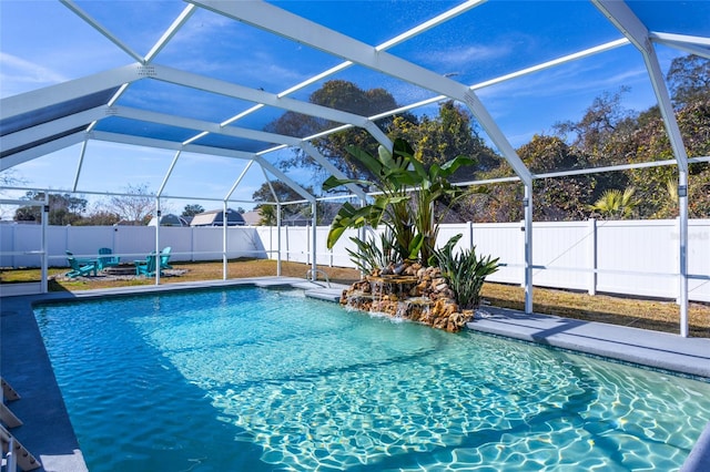 view of pool featuring pool water feature and a lanai