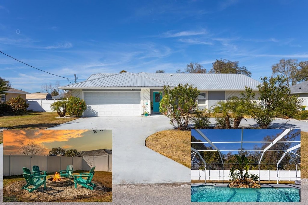 view of front facade featuring an outdoor fire pit, glass enclosure, and a garage